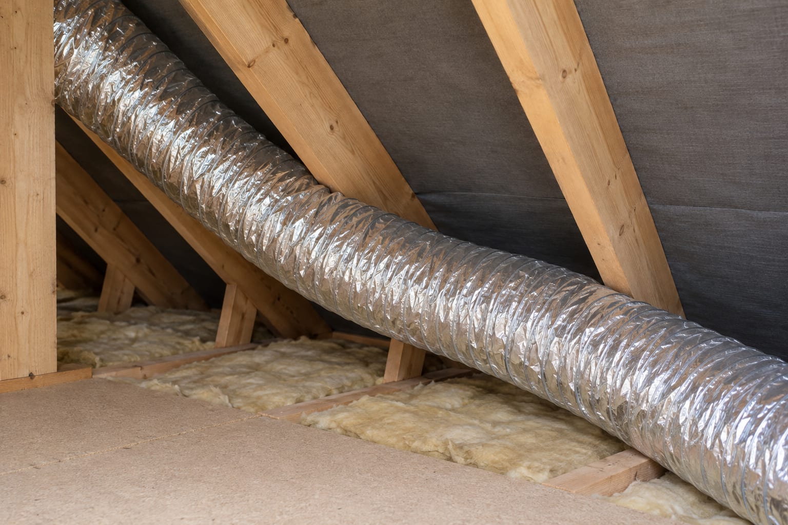 Short flexible foil tube gently curved through a loft