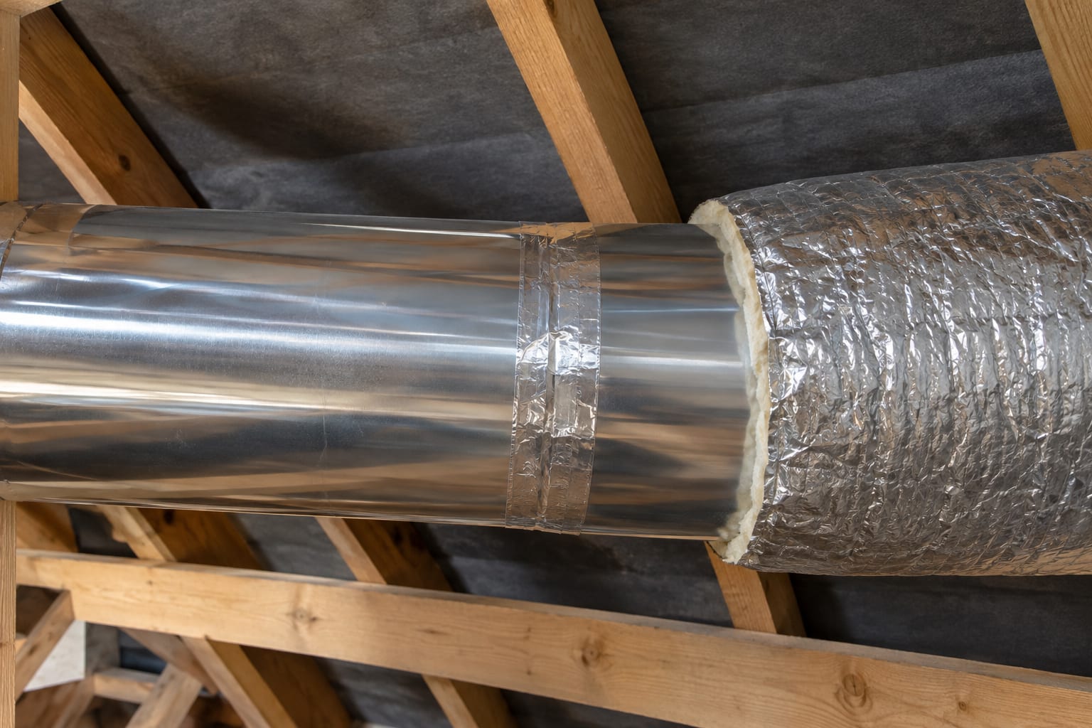 Sealed reflective tube joints and an insulation sleeve inside a loft